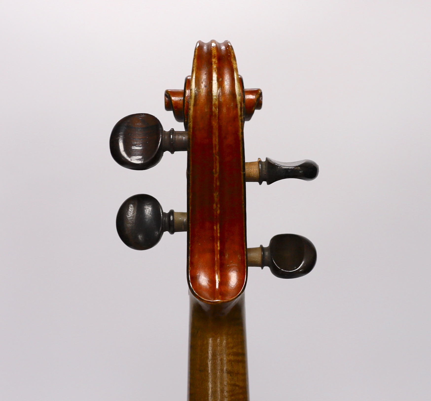 A cased late 19th/early 20th century French violin, bears Joseph Guarnerius label